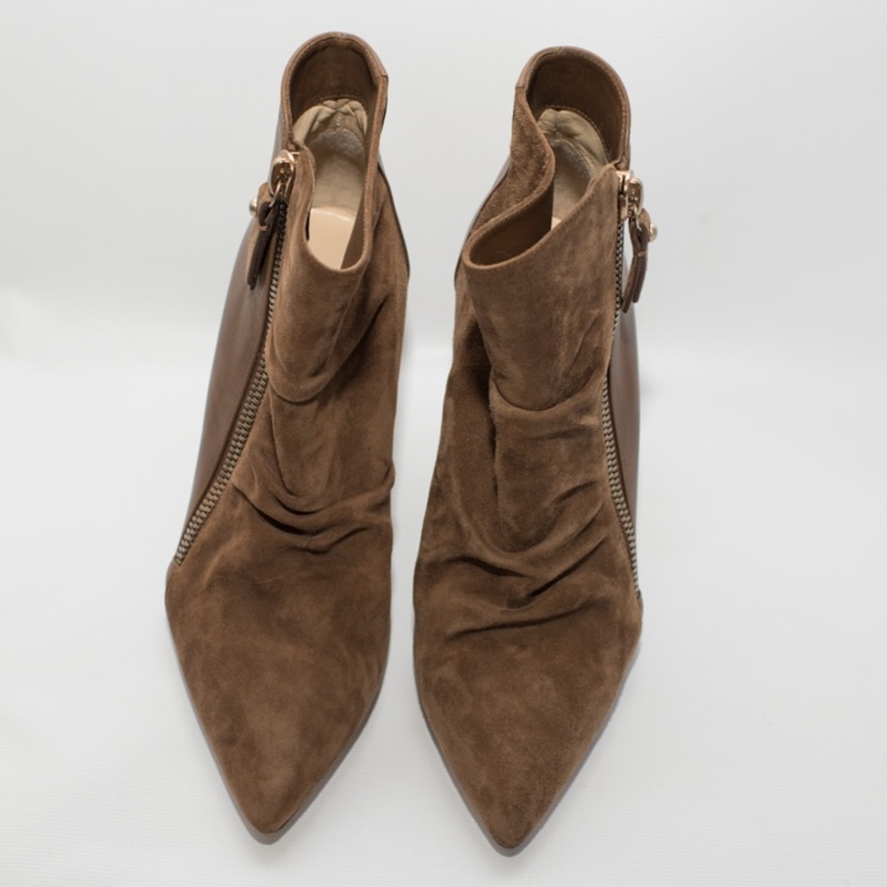 Beautiful and elegant Jimmy Choo booties.